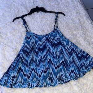 Blue flare top with daisy designs on the straps